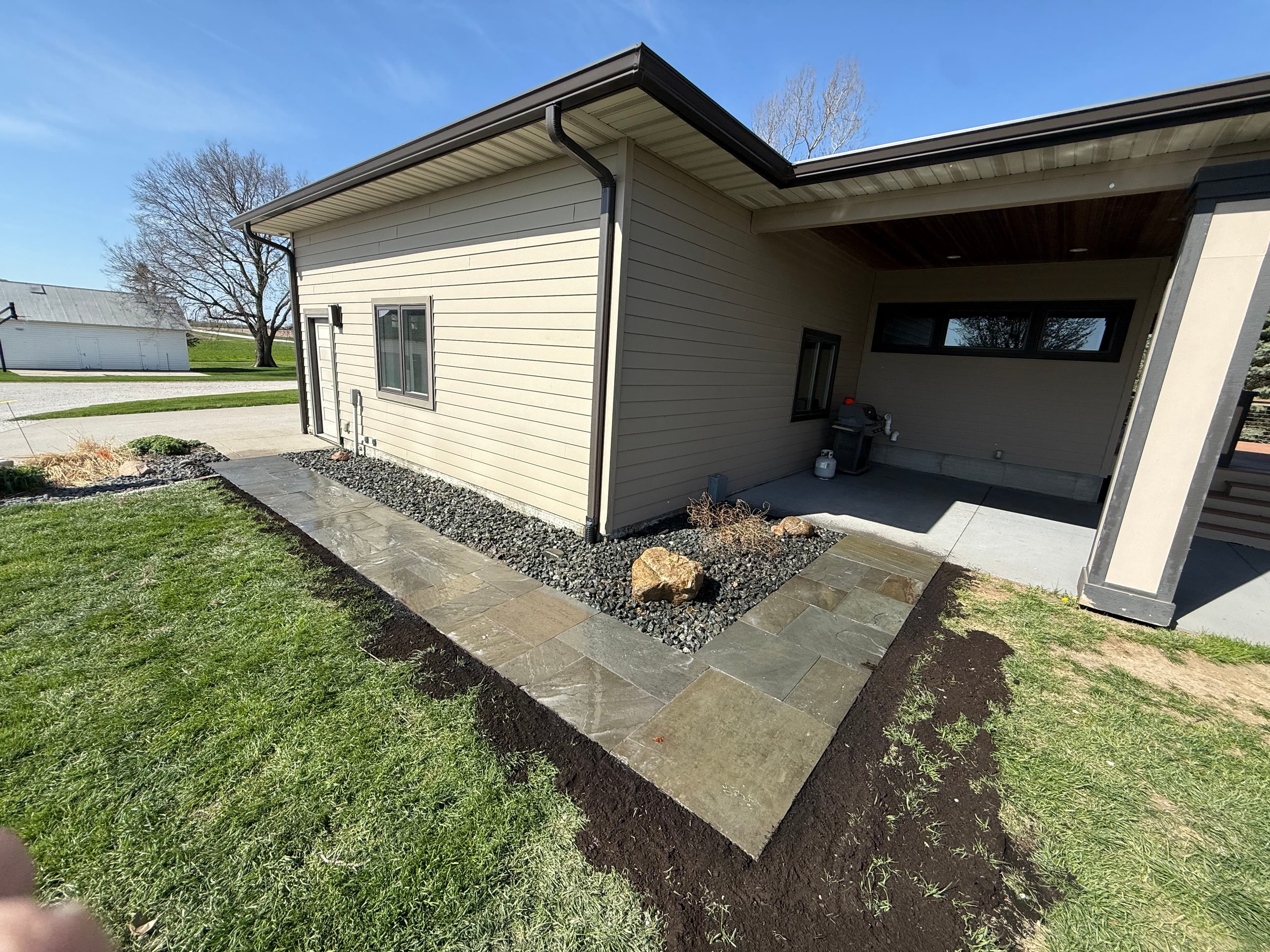 Project Sinking Paver Walkway Fixed With Fresh Landscaping to Match image