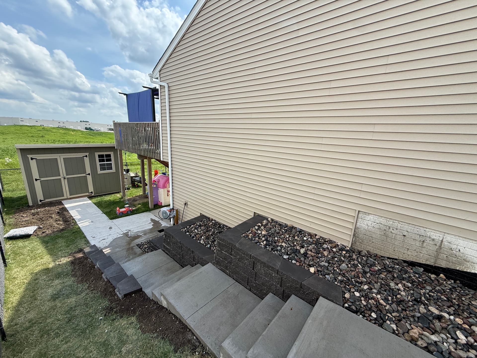 Gallery photos for Three Retaining Walls and Concrete Steps Fix a Tough Side Yard Slope: Image #2