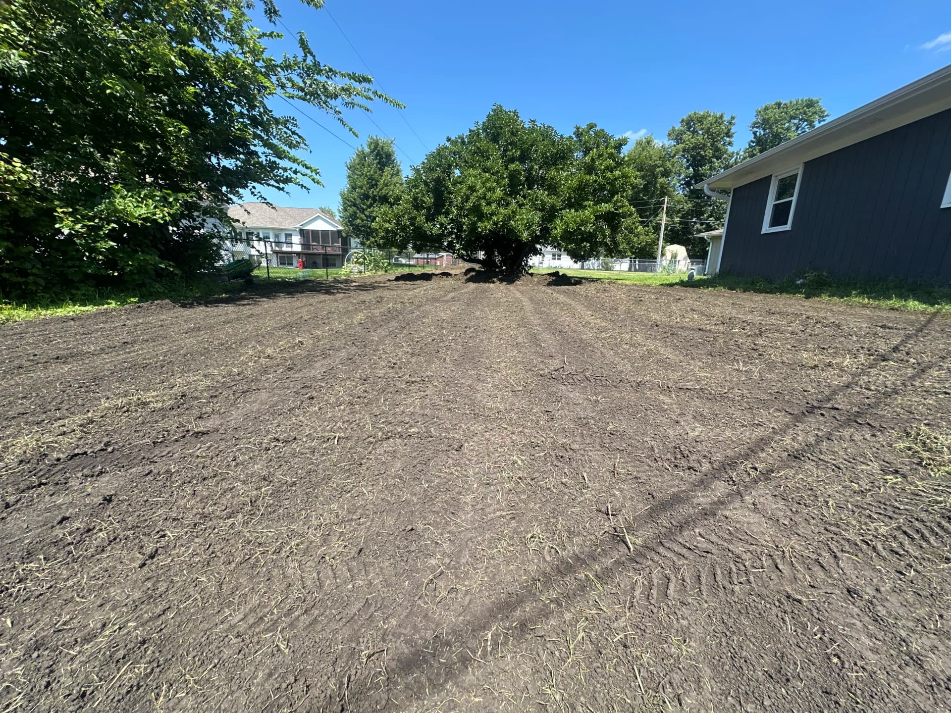 Gallery photos for Backyard Regrading Fix That Sends Water Away From the House: Image #1