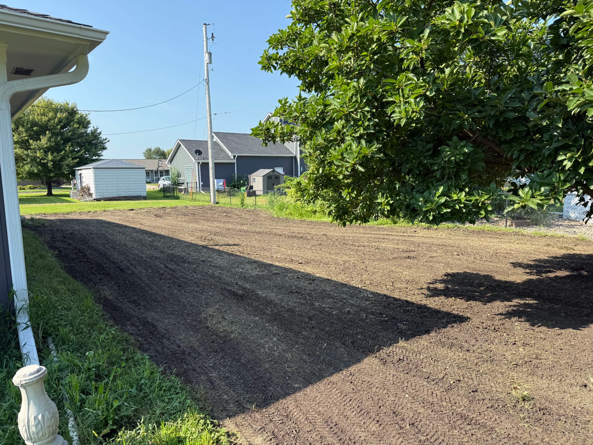 Backyard Regrading Fix That Sends Water Away From the House image